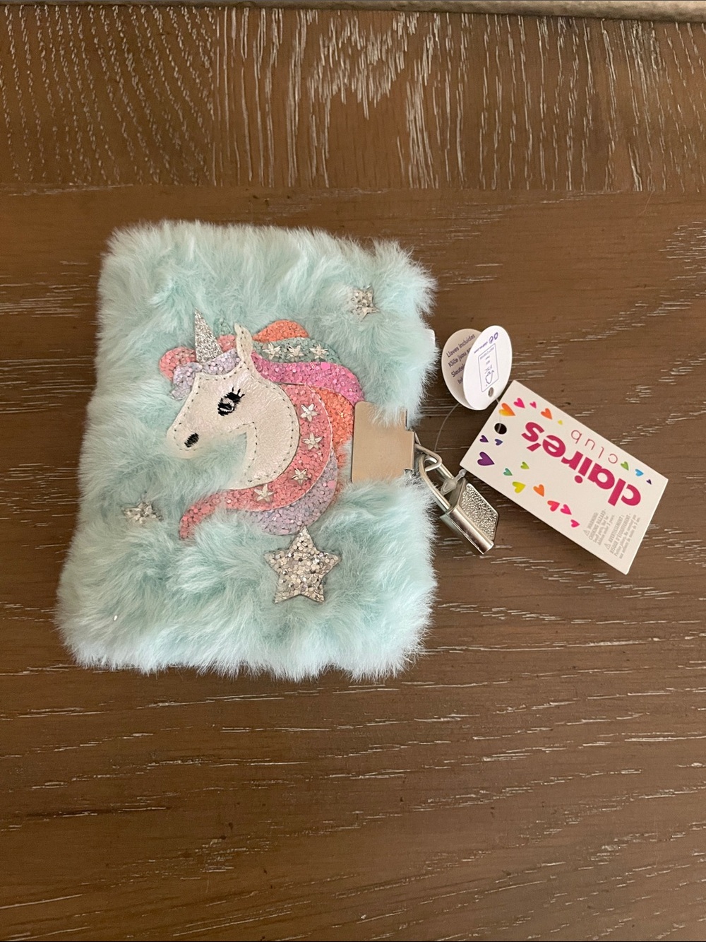 Claire's Mint Mini Fuzzy Unicorn Lock Notebook with Pink and Silver Accents